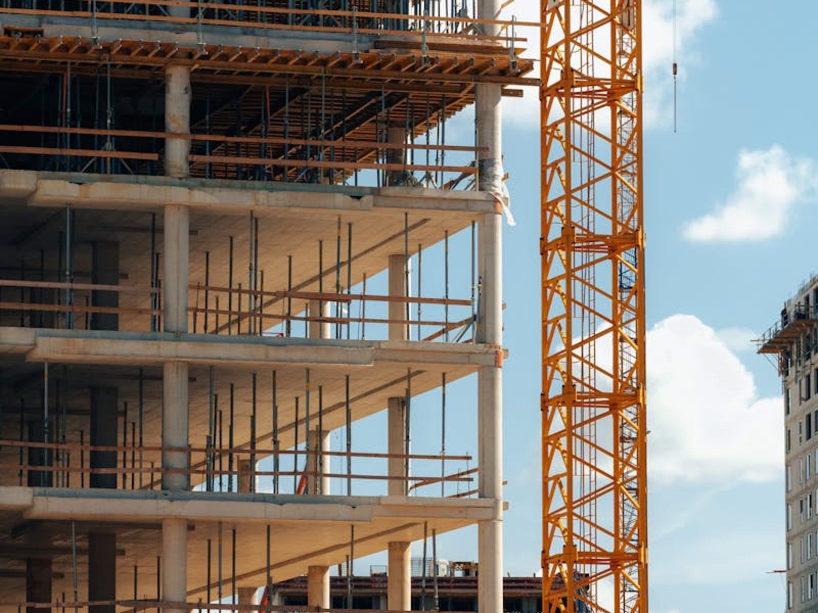 View of a mid-construction high-rise with cranes in Bratislava, Slovensko.